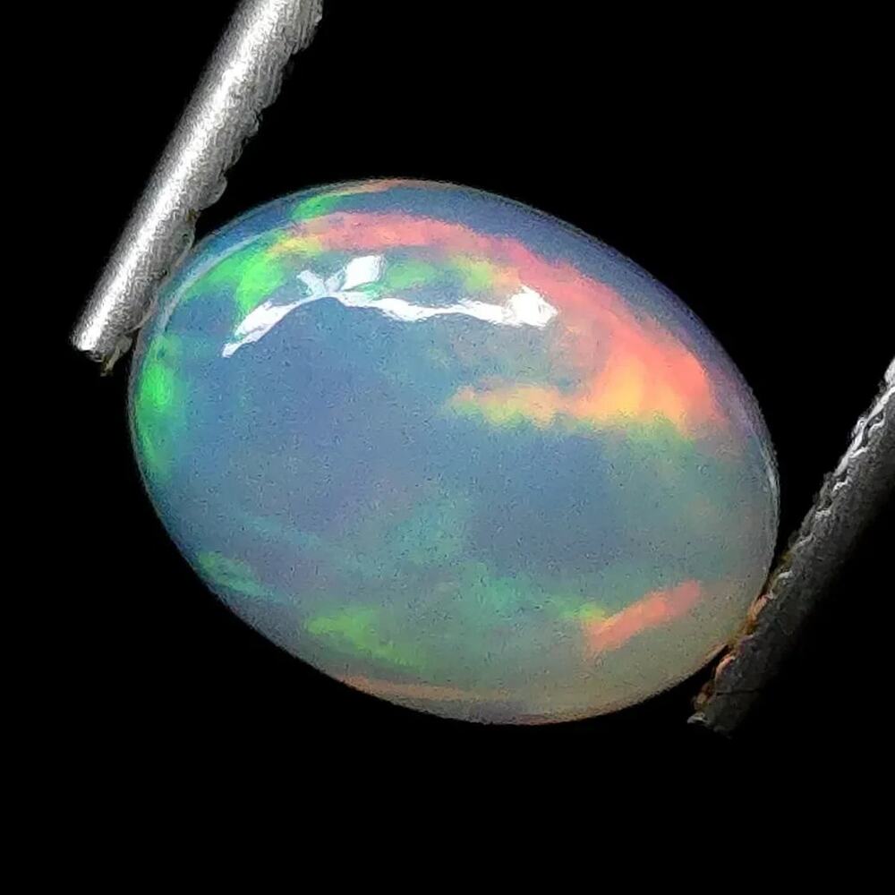 0.83 Ct Natural Ethiopian Fire Opal Play of Color 8x6mm Gem